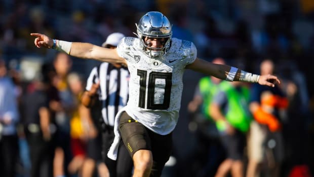 Bo Nix celebrates after a touchdown against Arizona State.